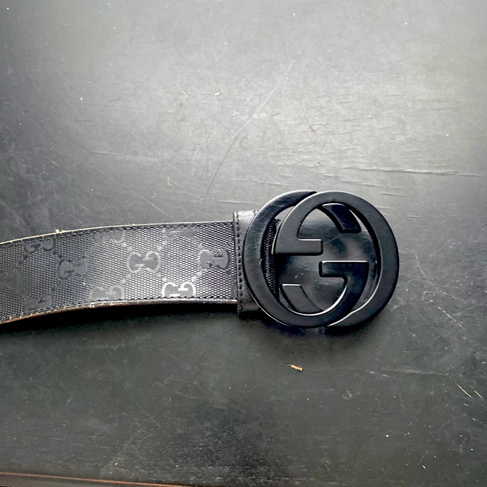 Triple black Gucci belt
